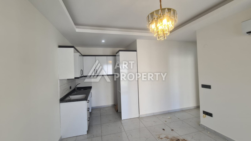 Квартира планировки 1+1 в комплексе с развитой инфраструктурой в районе Махмутлар, 55м2 - Ракурс 10