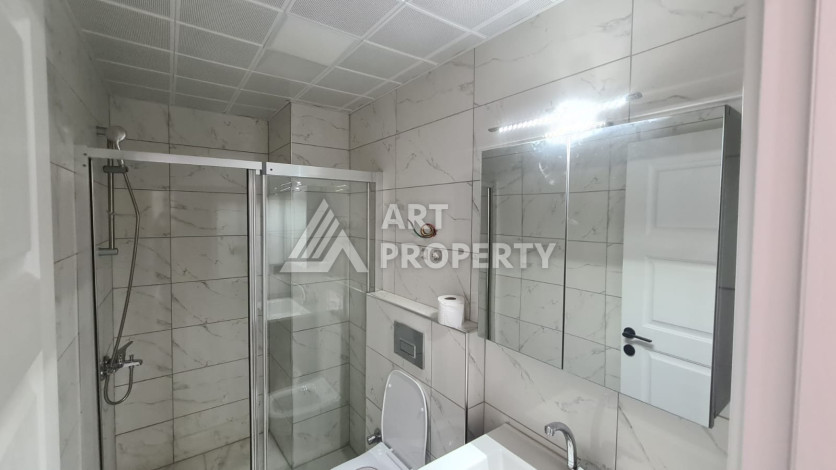 Квартира планировки 1+1 в комплексе с развитой инфраструктурой в районе Махмутлар, 55м2 - Ракурс 12