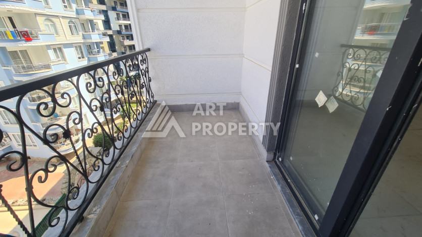 Квартира планировки 1+1 в комплексе с развитой инфраструктурой в районе Махмутлар, 55м2 - Ракурс 20