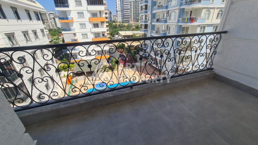 Квартира планировки 1+1 в комплексе с развитой инфраструктурой в районе Махмутлар, 55м2 - Ракурс 23