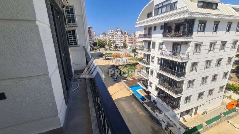 Квартира планировки 1+1 в комплексе с развитой инфраструктурой в районе Махмутлар, 55м2 - Ракурс 25