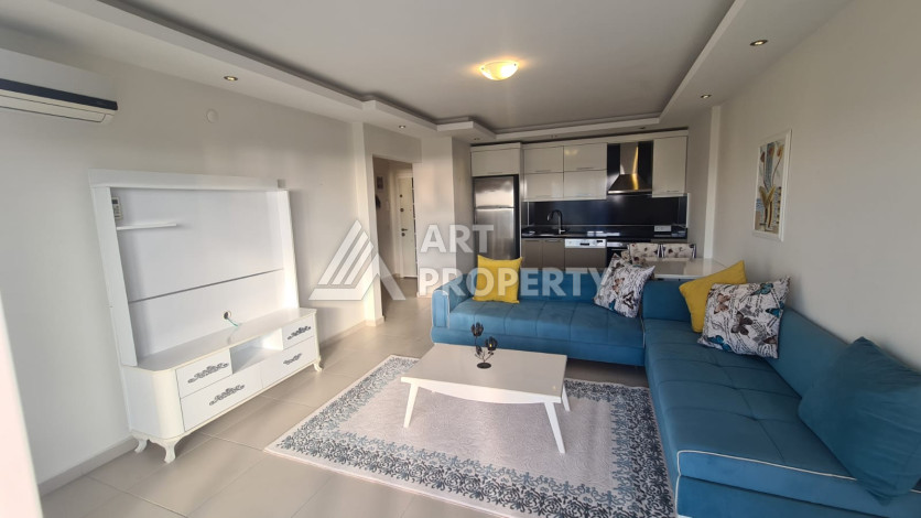 Меблированная квартира планировки 1+1 в районе Махмутлар, 70м2 - Ракурс 5