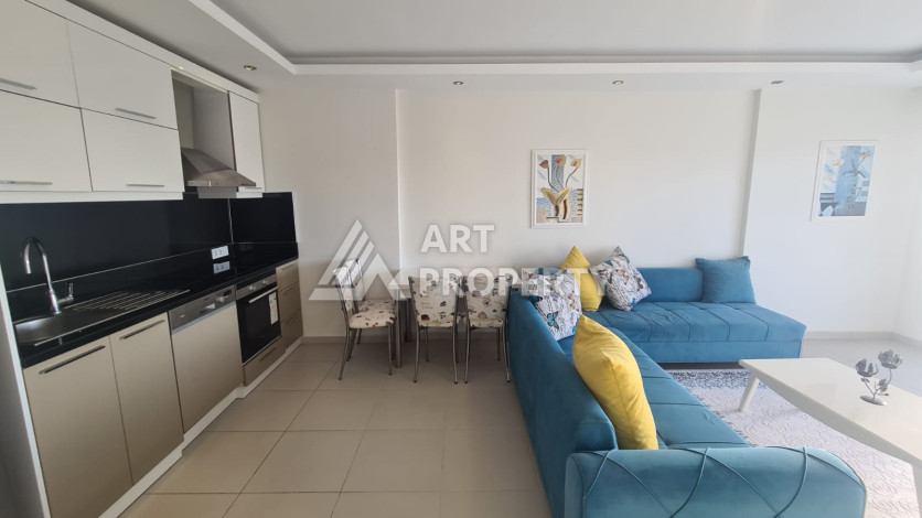 Меблированная квартира планировки 1+1 в районе Махмутлар, 70м2 - Ракурс 8