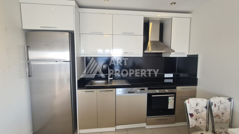 Меблированная квартира планировки 1+1 в районе Махмутлар, 70м2 - Ракурс 10