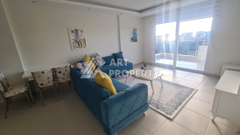 Меблированная квартира планировки 1+1 в районе Махмутлар, 70м2 - Ракурс 11