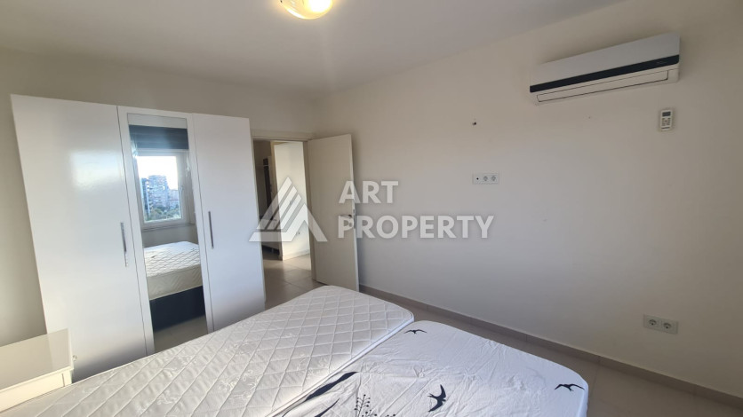 Меблированная квартира планировки 1+1 в районе Махмутлар, 70м2 - Ракурс 14