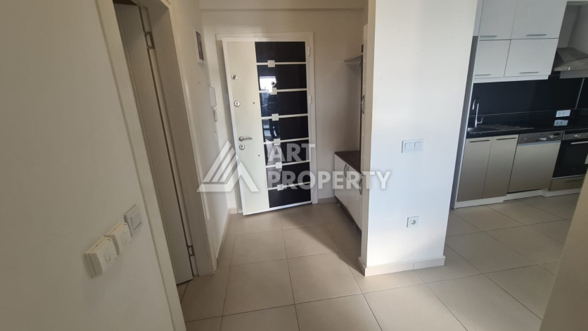 Меблированная квартира планировки 1+1 в районе Махмутлар, 70м2 - Ракурс 15