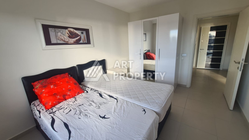 Меблированная квартира планировки 1+1 в районе Махмутлар, 70м2 - Ракурс 17