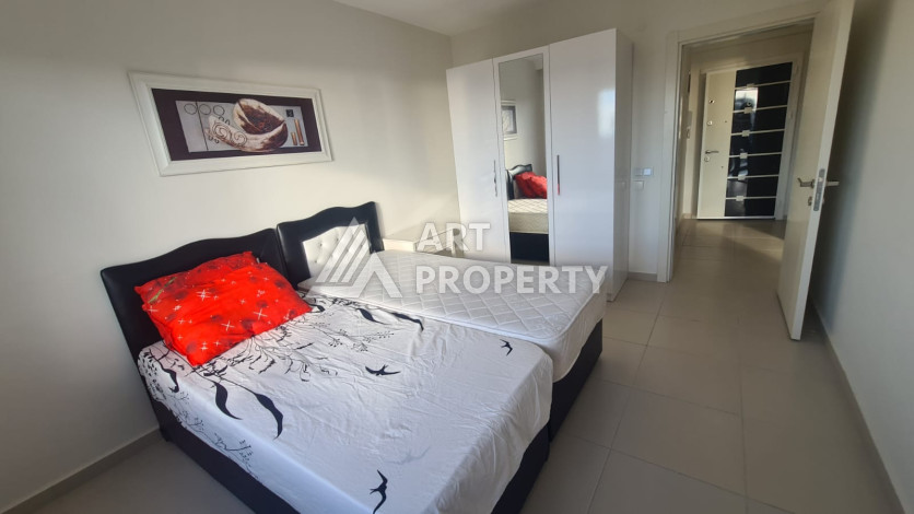 Меблированная квартира планировки 1+1 в районе Махмутлар, 70м2 - Ракурс 18