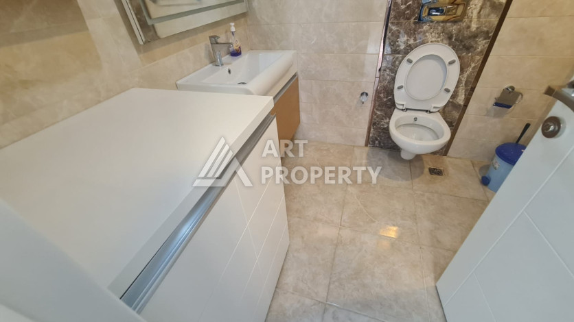 Меблированная квартира планировки 1+1 в районе Махмутлар, 70м2 - Ракурс 21