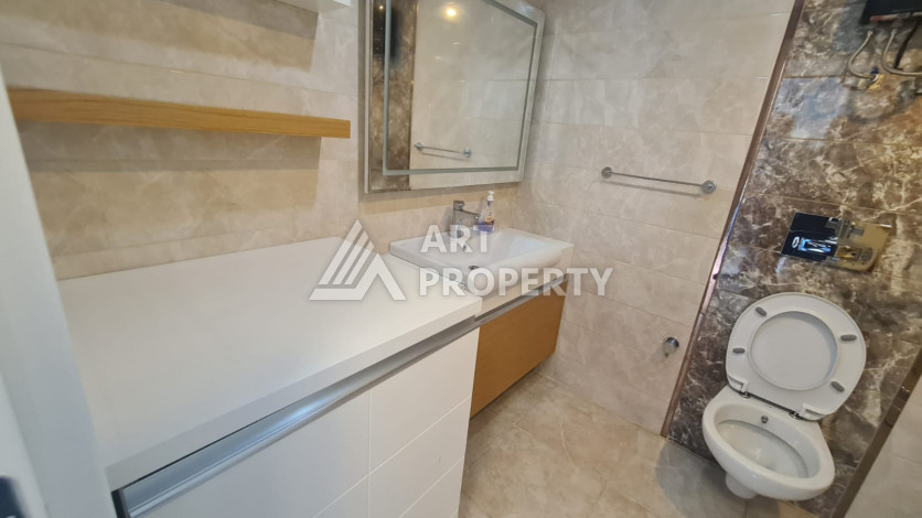 Меблированная квартира планировки 1+1 в районе Махмутлар, 70м2 - Ракурс 23