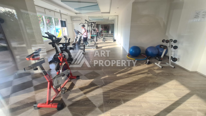 Меблированная квартира планировки 1+1 в районе Махмутлар, 70м2 - Ракурс 33