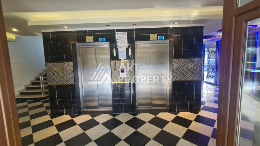 Меблированная квартира планировки 1+1 в районе Махмутлар, 70м2 - Ракурс 37