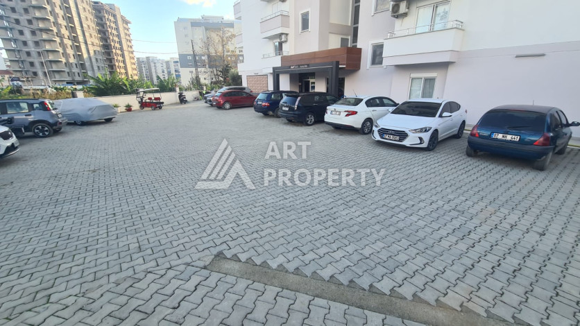 Меблированная квартира планировки 1+1 в районе Махмутлар, 70м2 - Ракурс 39