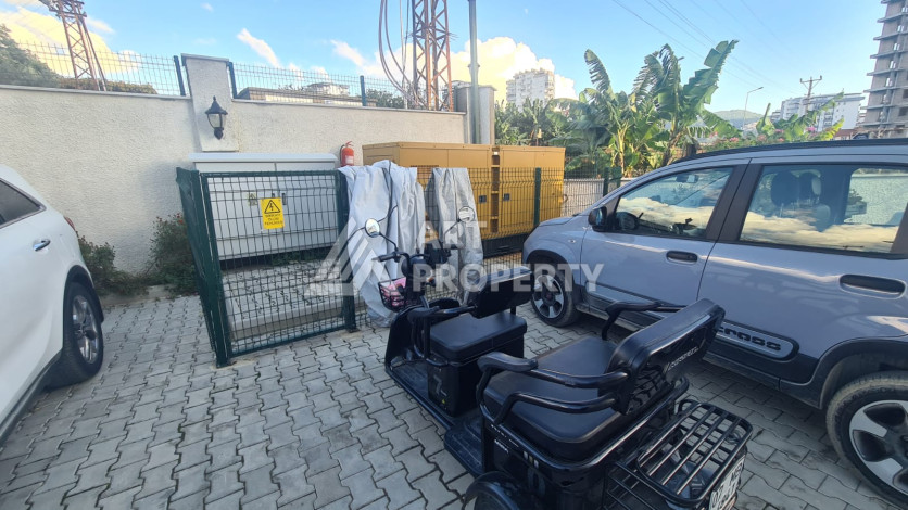 Меблированная квартира планировки 1+1 в районе Махмутлар, 70м2 - Ракурс 41