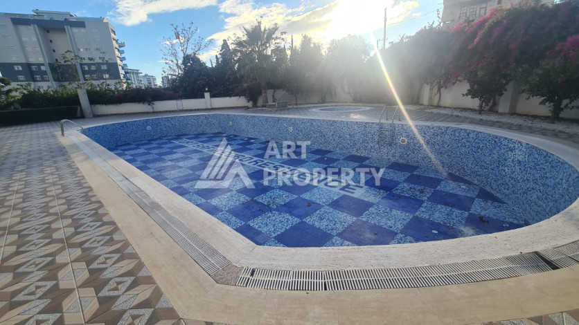 Меблированная квартира планировки 1+1 в районе Махмутлар, 70м2 - Ракурс 42