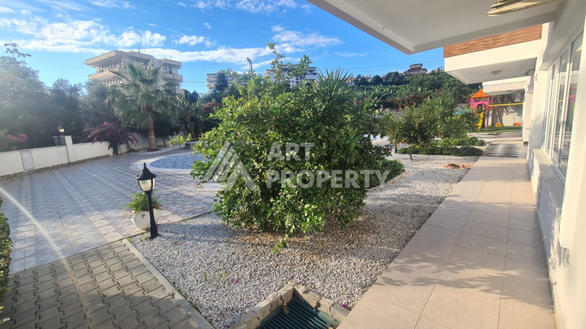 Меблированная квартира планировки 1+1 в районе Махмутлар, 70м2 - Ракурс 43