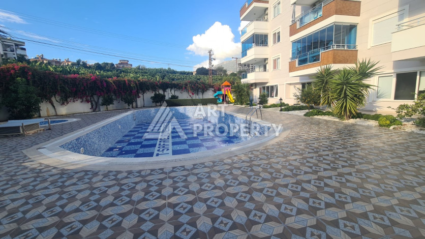 Меблированная квартира планировки 1+1 в районе Махмутлар, 70м2 - Ракурс 44