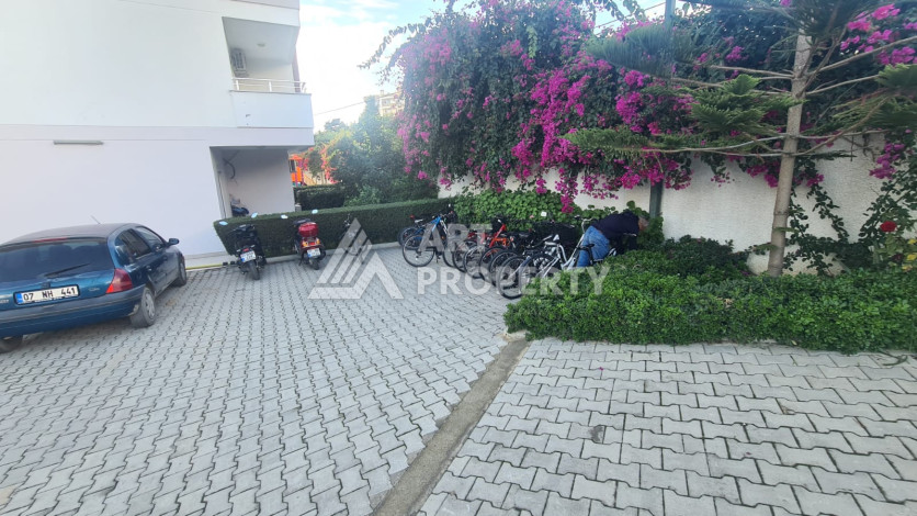 Меблированная квартира планировки 1+1 в районе Махмутлар, 70м2 - Ракурс 45