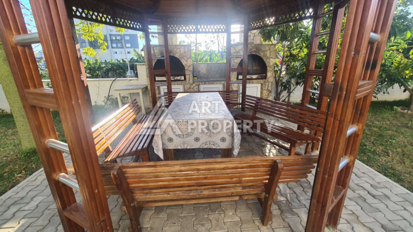 Меблированная квартира планировки 1+1 в районе Махмутлар, 70м2 - Ракурс 46