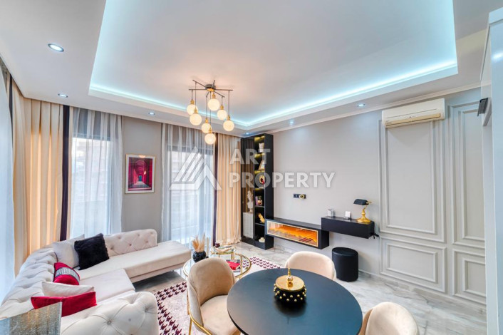 Шикарные апартаменты планировки 1+1 в районе Махмутлар, 55м2 - Ракурс 4