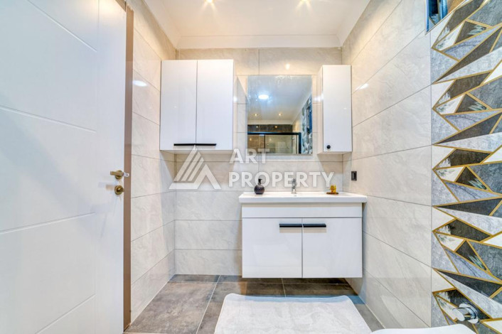 Шикарные апартаменты планировки 1+1 в районе Махмутлар, 55м2 - Ракурс 9