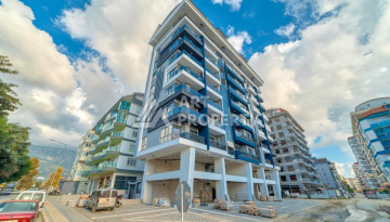 Шикарные апартаменты планировки 1+1 в районе Махмутлар, 55м2 - Ракурс 13