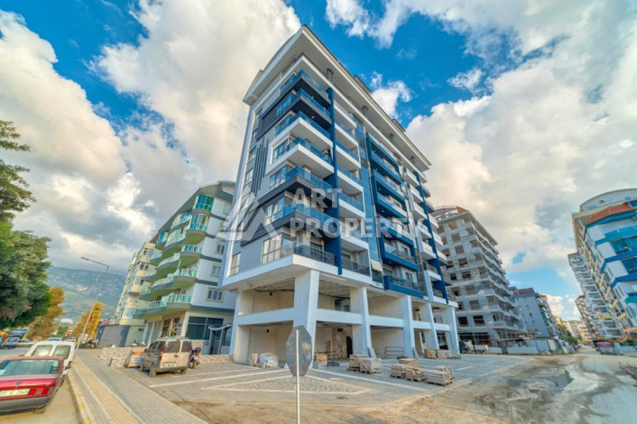 Шикарные апартаменты планировки 1+1 в районе Махмутлар, 55м2 - Ракурс 12