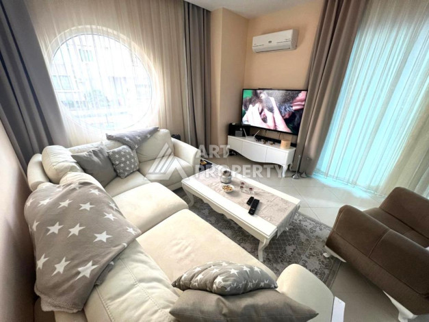 Меблированные апартаменты планировки 1+1 с большим балконом в районе Махмутлар, 60м2 - Ракурс 3