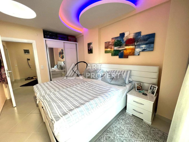 Меблированные апартаменты планировки 1+1 с большим балконом в районе Махмутлар, 60м2 - Ракурс 9