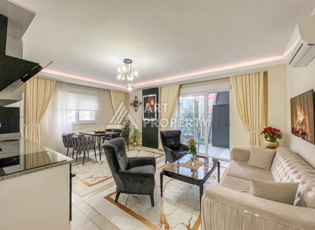 Меблированные апартаменты планировки 1+1 в районе Махмутлар, 65м2 - Ракурс 2