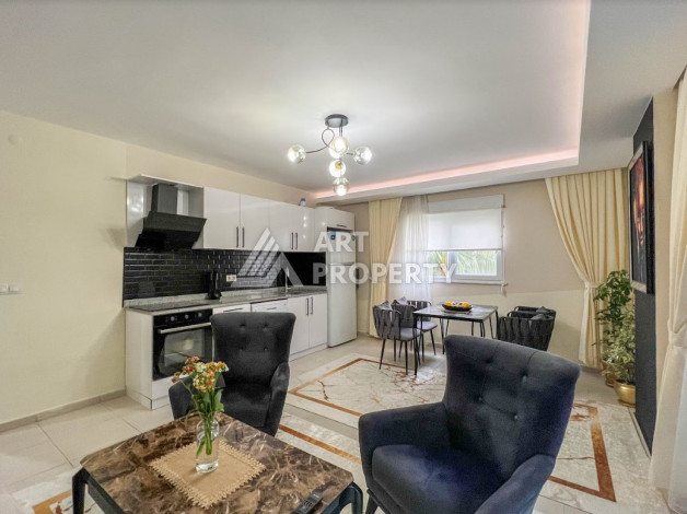 Меблированные апартаменты планировки 1+1 в районе Махмутлар, 65м2 - Ракурс 3