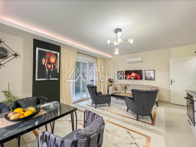 Меблированные апартаменты планировки 1+1 в районе Махмутлар, 65м2 - Ракурс 4