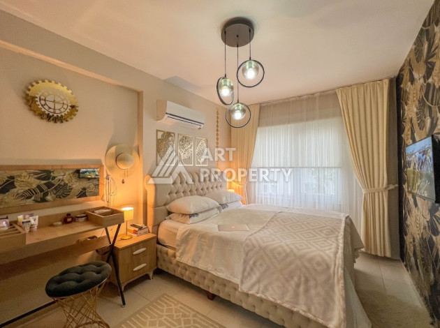 Меблированные апартаменты планировки 1+1 в районе Махмутлар, 65м2 - Ракурс 6