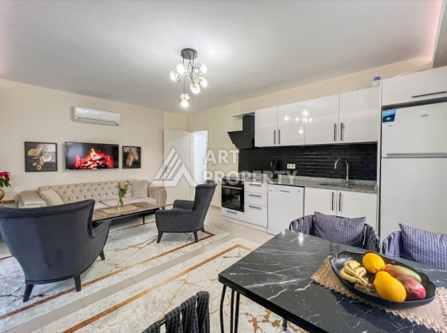 Меблированные апартаменты планировки 1+1 в районе Махмутлар, 65м2 - Ракурс 9