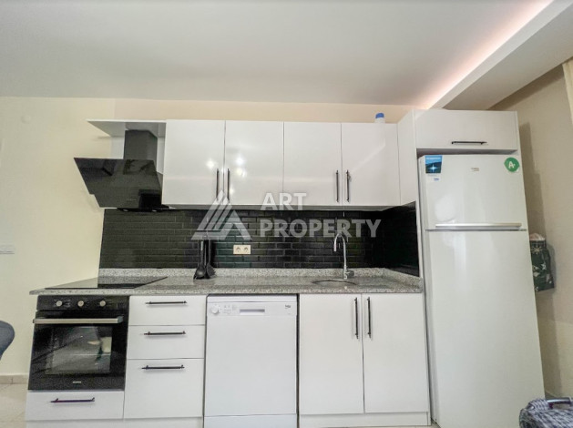 Меблированные апартаменты планировки 1+1 в районе Махмутлар, 65м2 - Ракурс 10