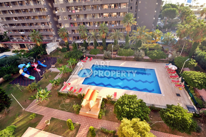 Апартаменты в 150ти метрах от моря в районе Махмутлар планировки 2+1, 120м2 - Ракурс 3