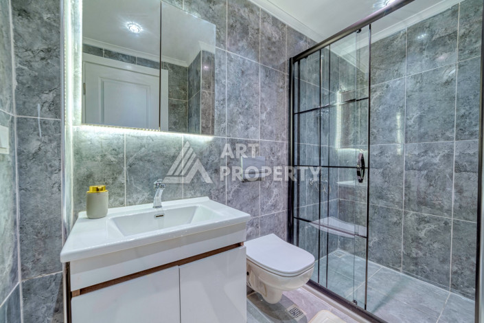 Дизайнерские апартаменты планировки 2+1 в районе Махмутлар, 95м2 - Ракурс 15