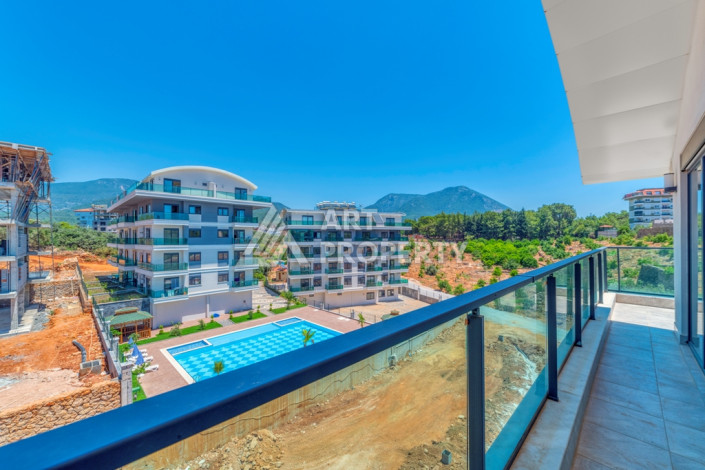 Двухуровневые апартаменты в новом комплексе планировки 2+1 в районе Оба, 100м2 - Ракурс 2