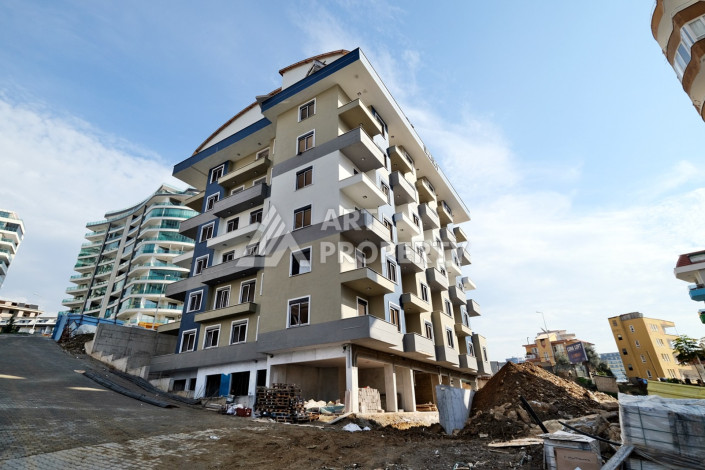 Квартира 1+1, 50м2, в доме на финальной стадии строительства, в районе Махмутлар, в 600 метрах от моря. - Ракурс 5