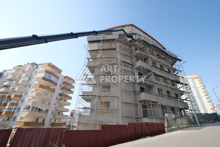 Квартира 1+1, 50м2, в доме на финальной стадии строительства, в районе Махмутлар, в 600 метрах от моря. - Ракурс 7