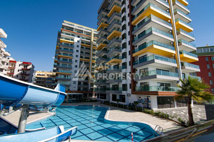 Апартаменты 1+1, 65м2, в резиденции класса люкс на первой береговой линии в Махмутларе - Ракурс 3