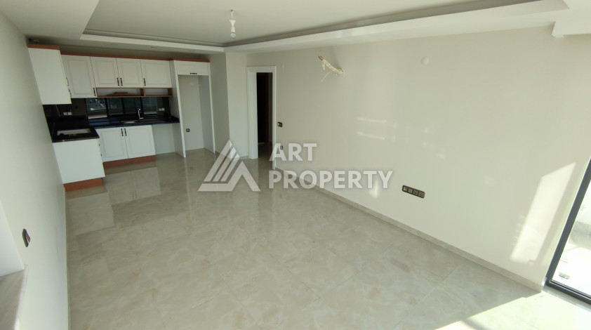 Апартаменты 1+1, 65м2, в резиденции класса люкс на первой береговой линии в Махмутларе - Ракурс 15