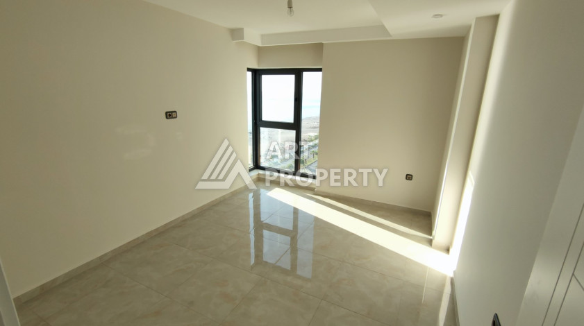 Апартаменты 1+1, 65м2, в резиденции класса люкс на первой береговой линии в Махмутларе - Ракурс 17