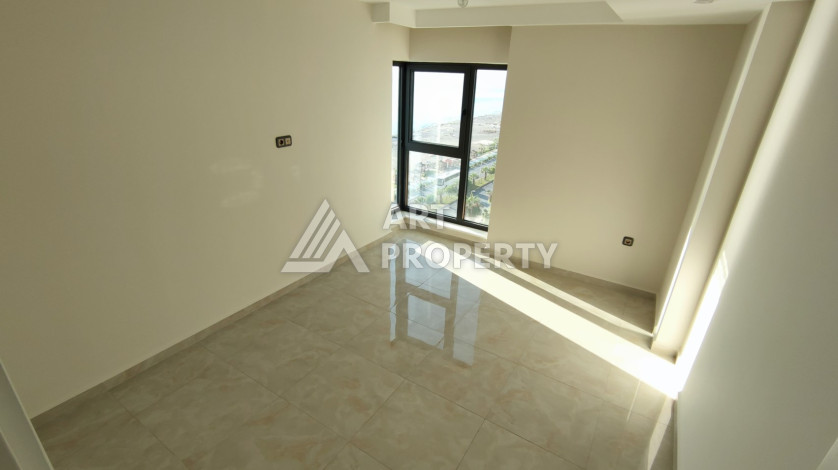 Апартаменты 1+1, 65м2, в резиденции класса люкс на первой береговой линии в Махмутларе - Ракурс 18