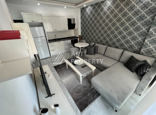 Уютные апартаменты планировки 1+1 в престижном районе Оба, 50м2 - Ракурс 3