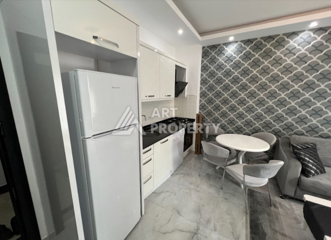 Уютные апартаменты планировки 1+1 в престижном районе Оба, 50м2 - Ракурс 4