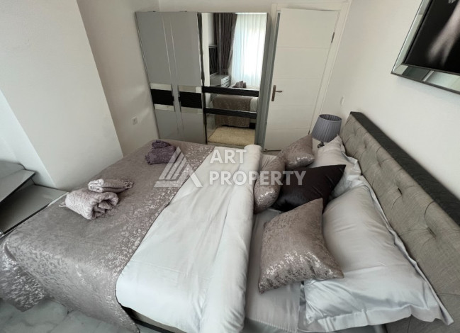 Уютные апартаменты планировки 1+1 в престижном районе Оба, 50м2 - Ракурс 5