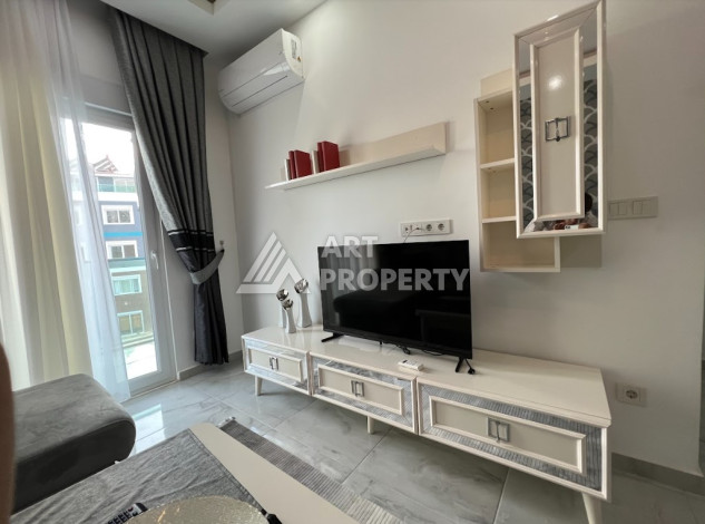 Уютные апартаменты планировки 1+1 в престижном районе Оба, 50м2 - Ракурс 6