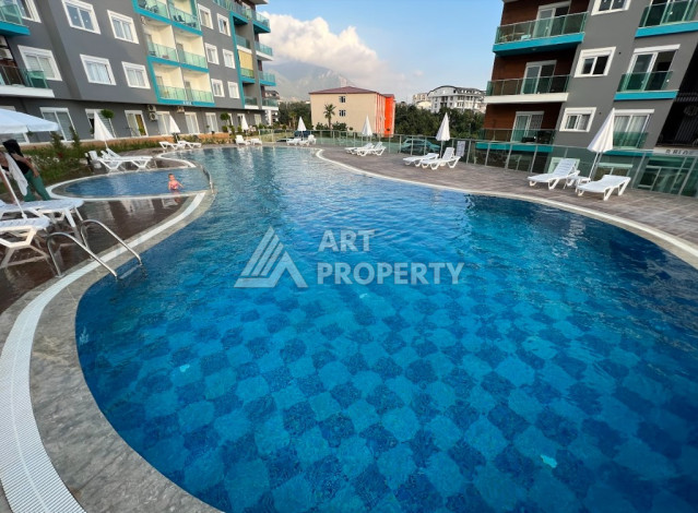 Апартаменты без мебели в стильном жилом комплексе планировки 1+1, 50м2 - Ракурс 3